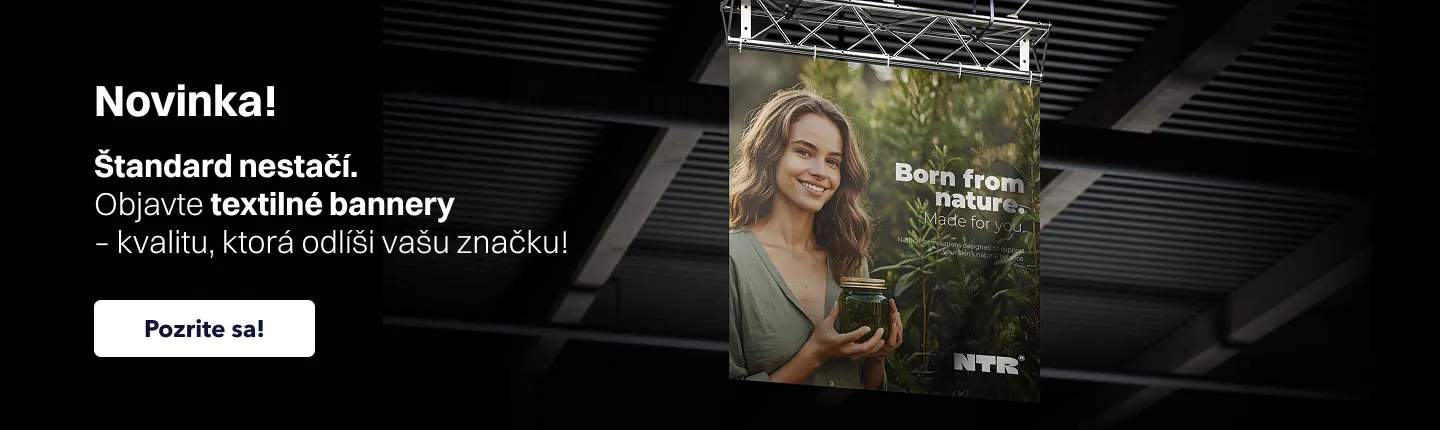 Baner na stránku propagujúci textilné bannery s textom „Novinka! Objavte textilné bannery – kvalitu, ktorá odlíši vašu značku”